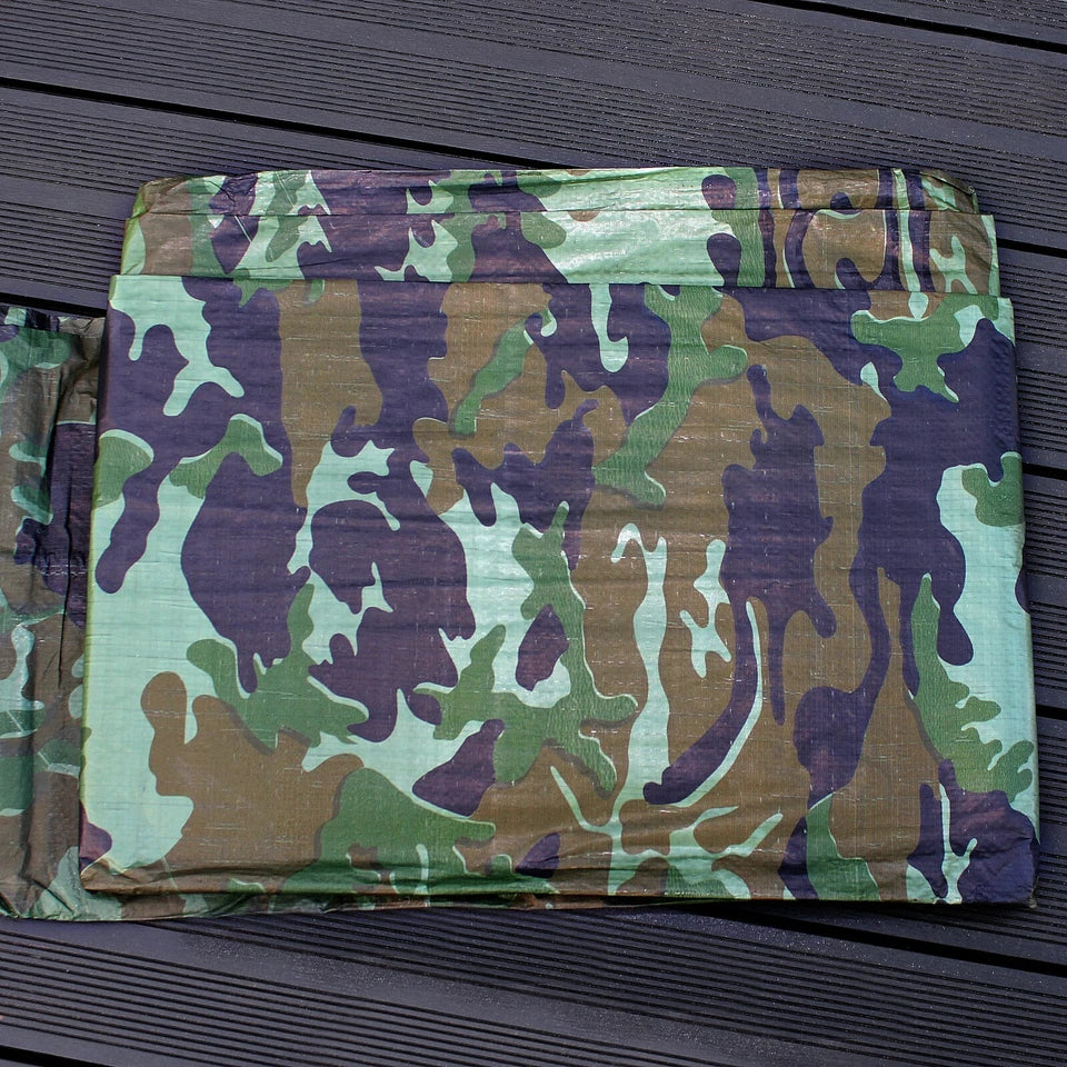 Green camouflage tarpaulin